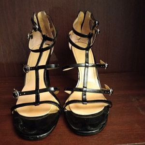 Black, leather strapped, high-heeled sandal. Size 9m.